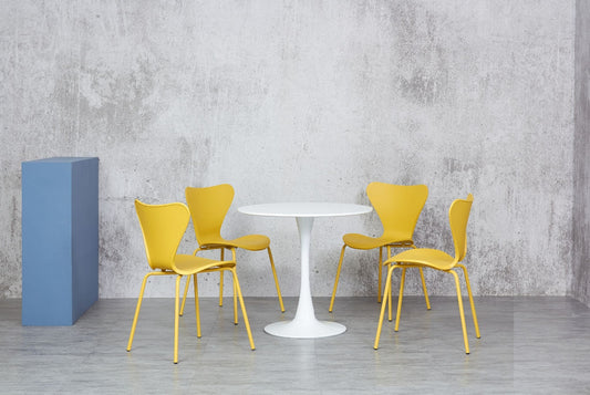 Heyden White Round MDF Dining Table with 4 Yellow Stackable Chairs with Plastic Seat